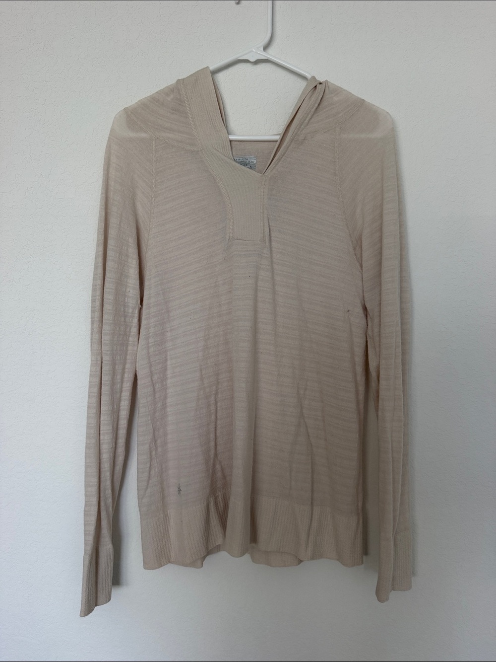 Athleta women’s V-Neck Hooded Sweater in Light Beige